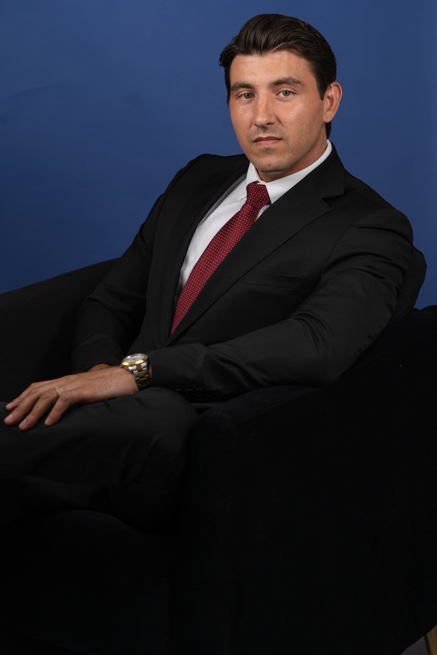 Attorney Benjamin Mamanne seated for a portrait
