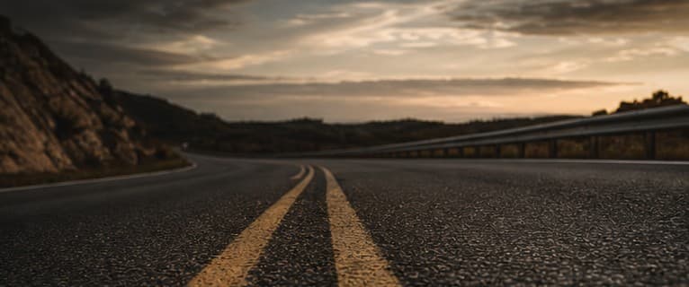 A winding road at dusk