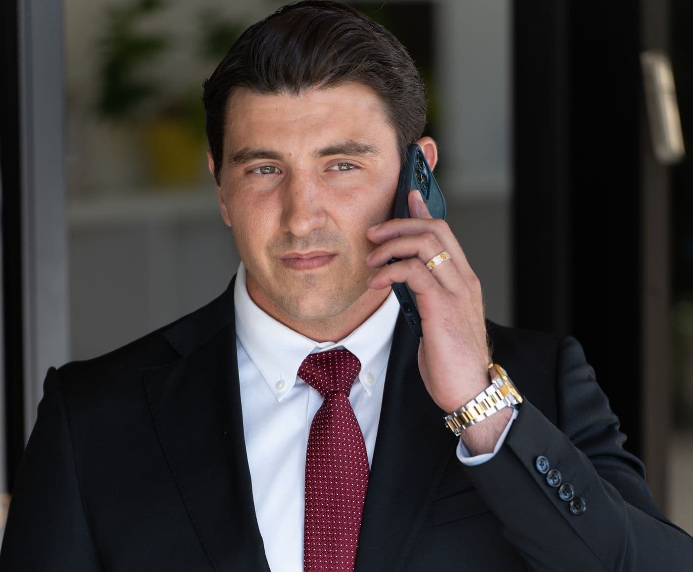 Benjamin Mamanne speaking with a client on the phone