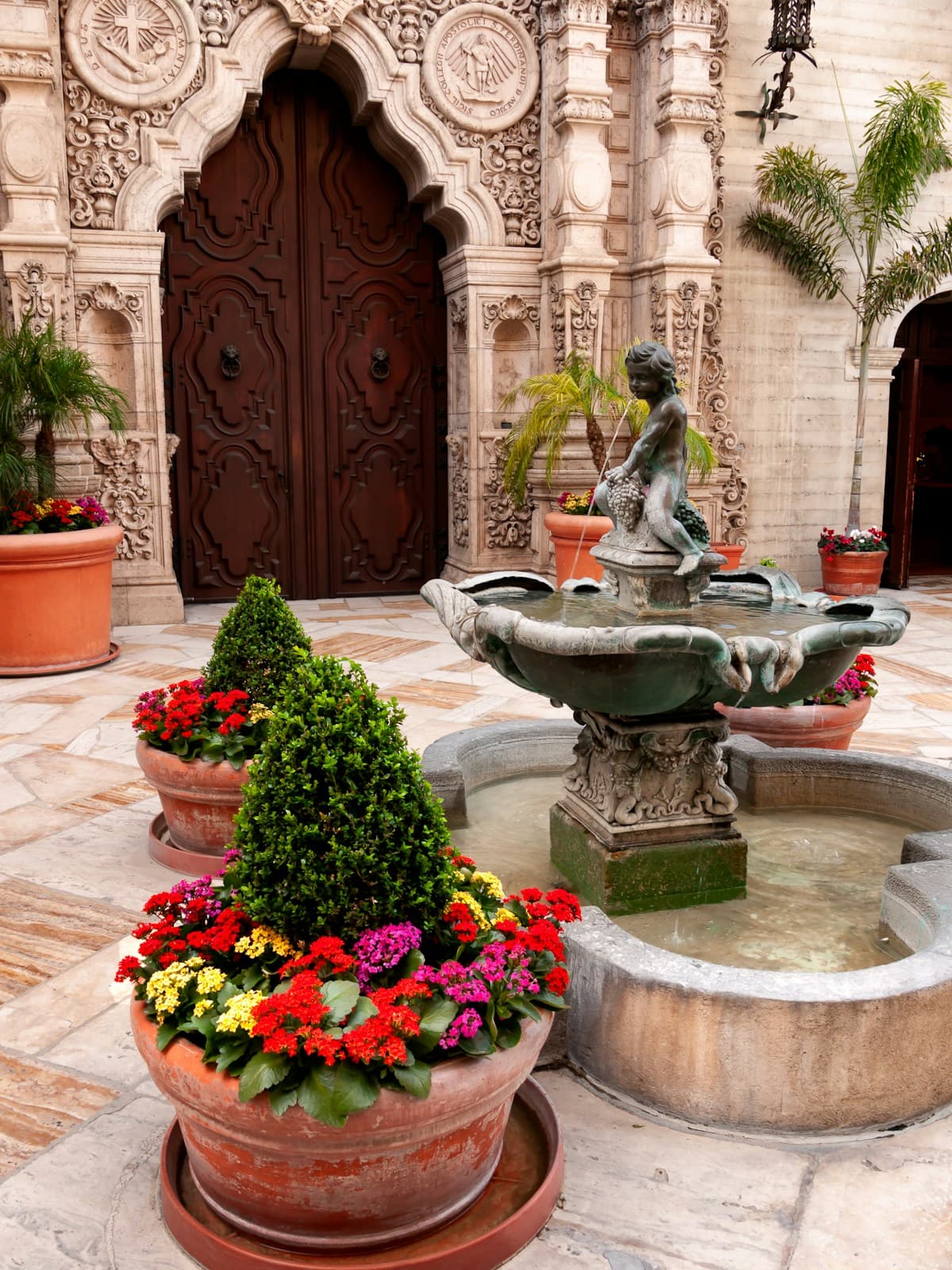 Historic architecture and a fountain in the Mission Inn courtyard in Riverside