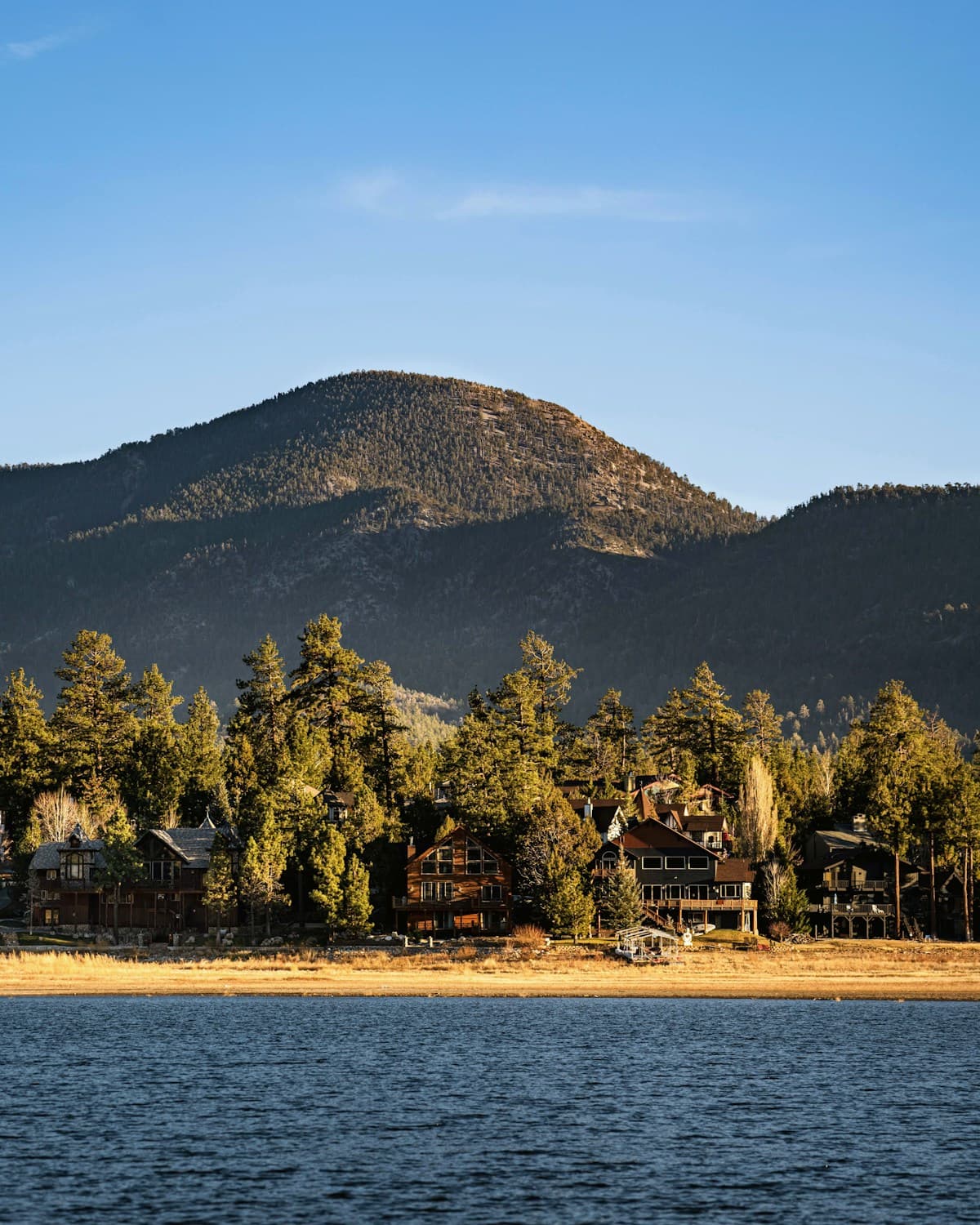 Mountain scenery and lakeside homes at Big Bear Lake in San Bernardino County